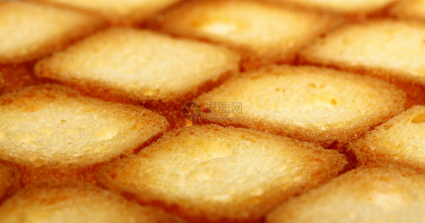 许多小干面包饼干作为纹理背景图片