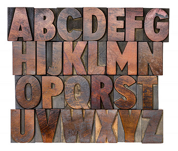 用彩色墨水染的文字印刷木型块的英文字母英语高清图片素材