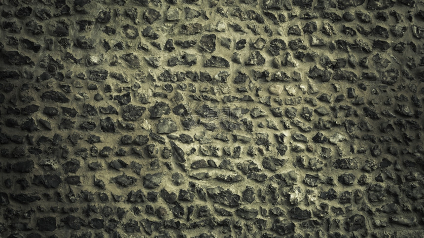 背景或纹理模式风格的灰色设计装饰有水泥的不均匀石墙壁表面图片