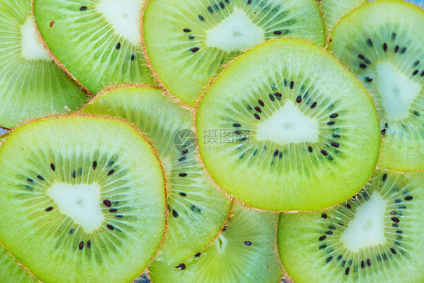 新鲜的kiwi切片新鲜的kiwikiwi背景图片