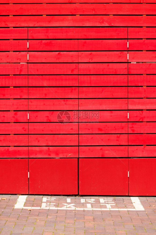红木板作为背景或纹身消防出口标志红木背景或纹身图片