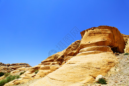 岩石与蓝天对决佩特拉约旦图片