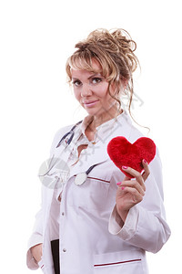 红心女脏病医生定期检查心脏病学概念听诊镜中年医生白围裙穿图片