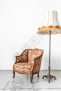 古老房间的棕色典式沙发有桌灯高清图片