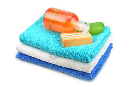 白色孤立的毛巾肥皂洗发水图片