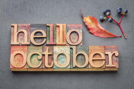 hello十月hello10月贺卡纸质木制石块与灰相对背景