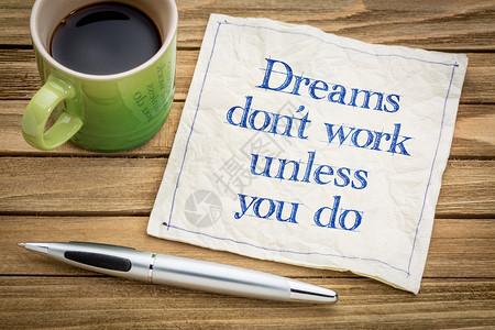 梦想不起作用除非你做笔迹在餐巾纸上加一杯咖啡图片