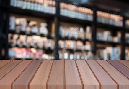 前景豪华棕色木头含模糊的咖啡店背景图片