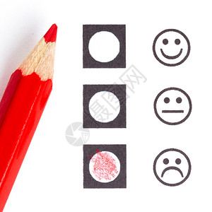 红铅笔选择正确的微笑湿图片