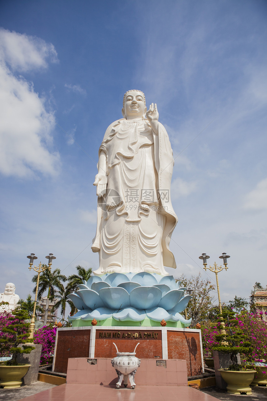 Maitreya佛像位于越南天江省MyThho市著名的VinhTrang塔图片