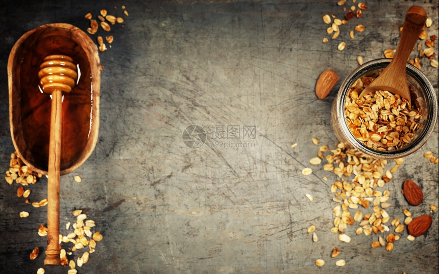 Granola和蜂蜜健康饮食概念复制空间背景顶层视野平坦图片