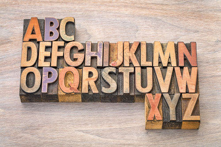 以旧印刷纸质木材类型块取代谷状木材的英文字母摘要xyz公司高清图片素材