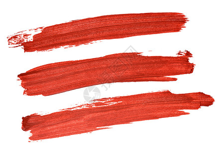 白色背景上隔离的一套红色丙烯刷笔中风图片