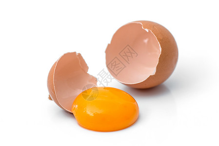 打破的鸡蛋被打破的蛋壳和蛋黄背景