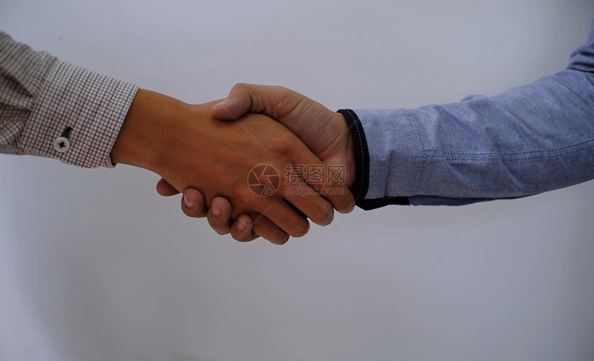形象商业人握手伙伴关系会议的概念图片