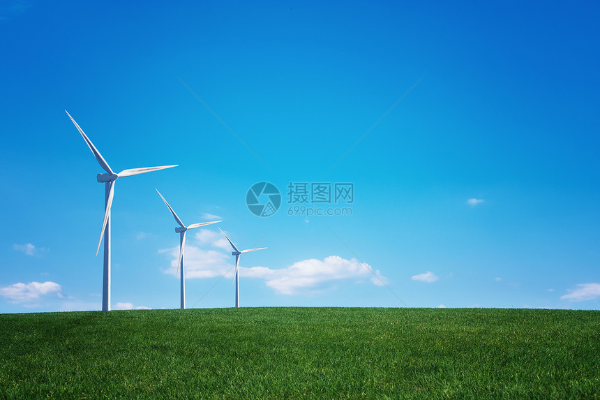 风力涡轮机和绿地蓝天空草的风力涡轮机图片