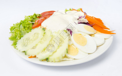 白色隔离的蔬菜沙拉图片
