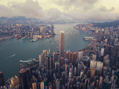 香港市中心维多利亚港智能城市金融区天梯大楼和高日落时空中景象技术高清图片素材