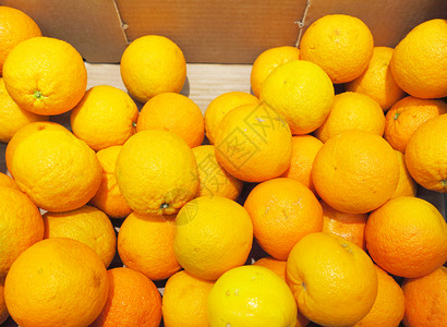 Ccurus成熟橙子水果装箱出售超级市场收获高清图片素材