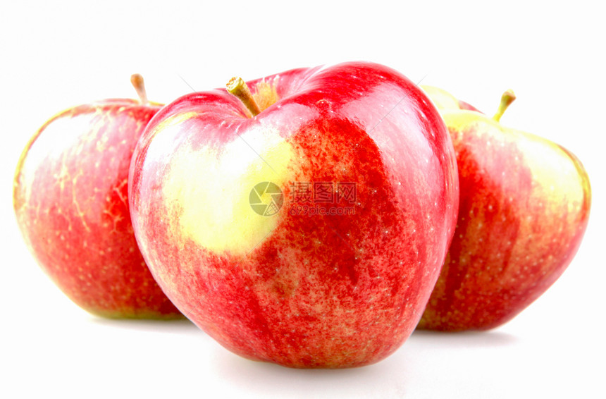 白色背景上孤立的新鲜红苹果图片