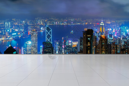 香港市和维多利亚有地砖板市中心的金融区和亚洲智能城市的商业中心夜里有天桥和高楼大背景图片