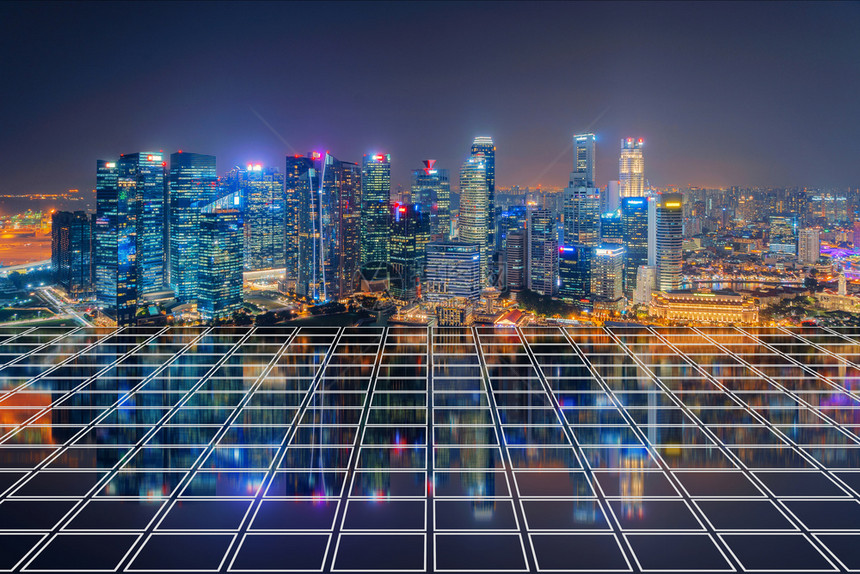 新加坡市位于MarinaBay地区有瓷砖板的新加坡市中心的金融区和亚洲智能城市的商业中心夜里天桥和高楼大图片