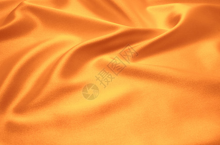 橙色布美丽的布背景背景