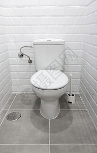 现代家中的白色厕所清洁室的白色厕所碗图片