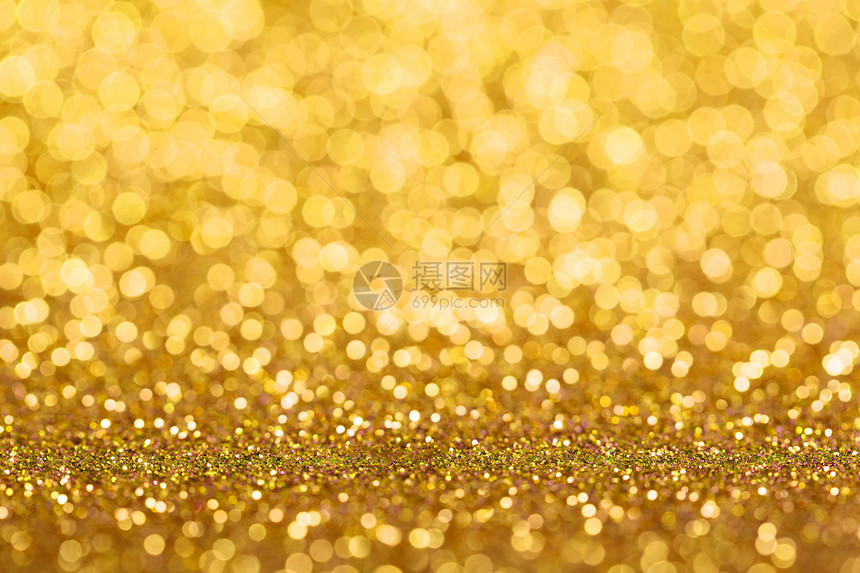金色闪亮的圣诞节抽象背景图片