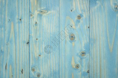 蓝色涂有条纹和结的木板图片