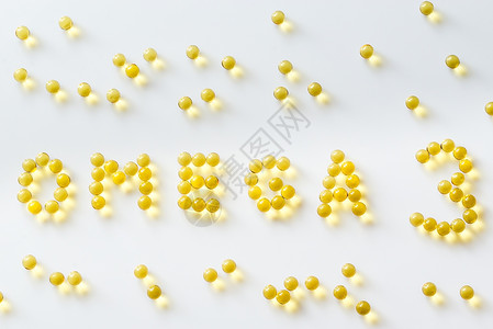 Omega3白色底的鱼油胶囊肝脏高清图片素材
