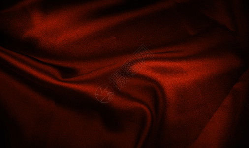 红色纹身黑暗的卷状花纹丝拉皮图片