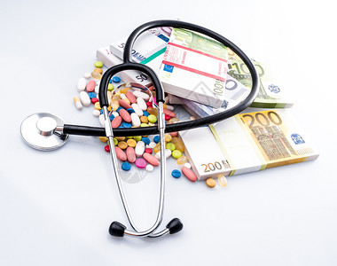 医用药丸欧元货币背景的听器制药的高清图片素材
