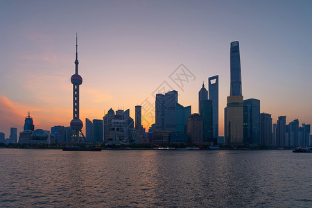 黄浦河在上海市首府的珍珠天线上亚洲智能城市的金融区和商业中心日出时Skycraper和TheBund附近的高楼建筑建筑学高清图片素材