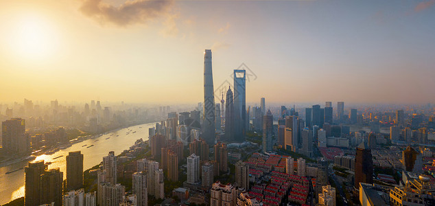 黄浦河HuangpuRiver上海市摩天大楼和高办公的空中景象日出时金融区和亚洲智能城市的商业中心珍珠高清图片素材