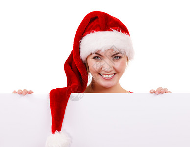 穿着圣达克萨斯帮手帽子的快乐女孩圣诞广告复制空间背景图片