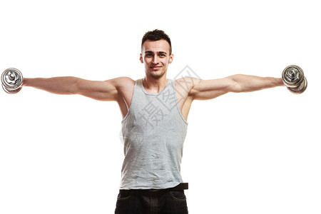 健壮体的人用哑铃锻炼肌肉健壮的年轻人举重白背景图片