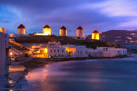 风车建筑图片希腊米科诺斯岛风Mykonos岛传统风车的著名景象风岛日出多云希腊米科诺斯岛风车的背景