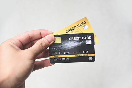 信用卡购物概念手持信用卡付款图片