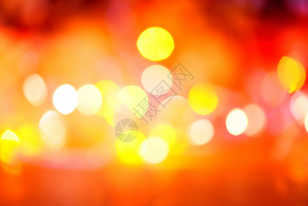 圣诞灯橙黄色和红黑抽象背景背景图片