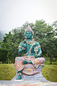 因陀佛像或绿色巨型神宗教佛重要标志和印度教盲文图片