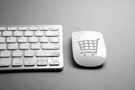 鼠和计算机键盘上的商业电子务图标图片