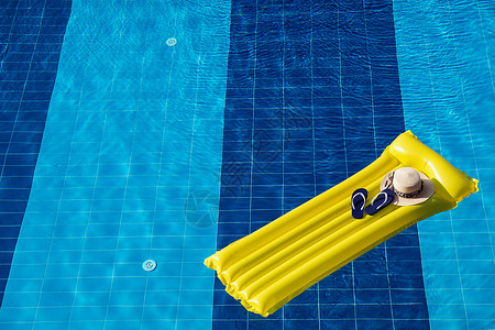 海滩暑假背景充气垫翻滚和游泳池的帽子背景图片