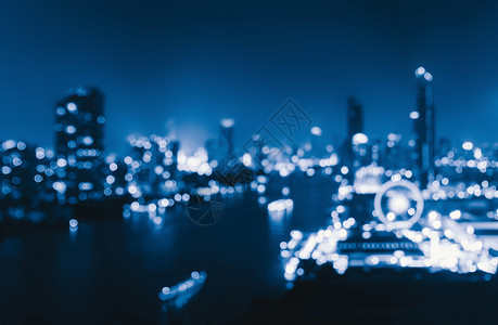市中心摩天大楼的布基背景城市有灯光夜里布卢利照片城市风景亮图片