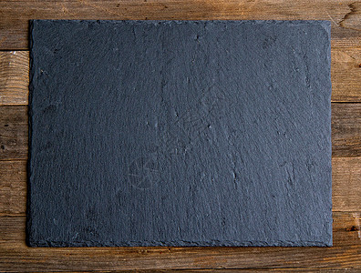 木头背景的石板平黑图片