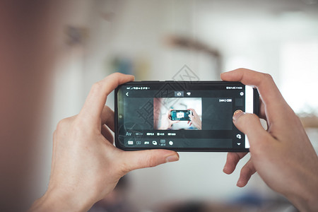 视频博客关闭黑智能手机摄像头拍和制作室内图片容制作背景