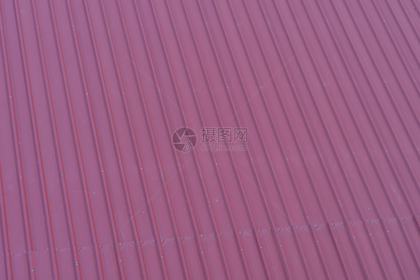 红金属板或钢屋顶瓷砖房建筑覆盖层的条纹或形图案摘要材料纹理建筑背景图片