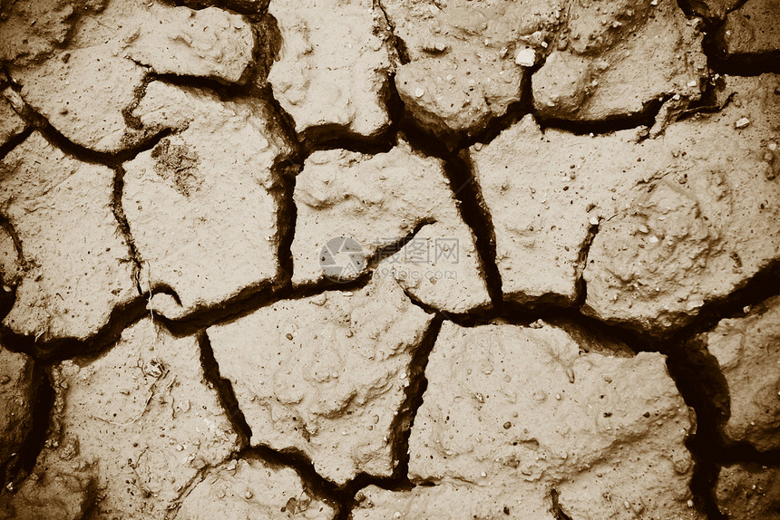 干旱季节土壤燥的裂口碎和粗地表泥土顶视图图片