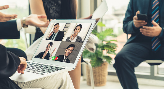 企务开栏在虚拟工作场所或远程办公室举行视频电话小组商业人员会议远程工作电话会议使用智能视频技术与专业企务的同事进行沟通背景