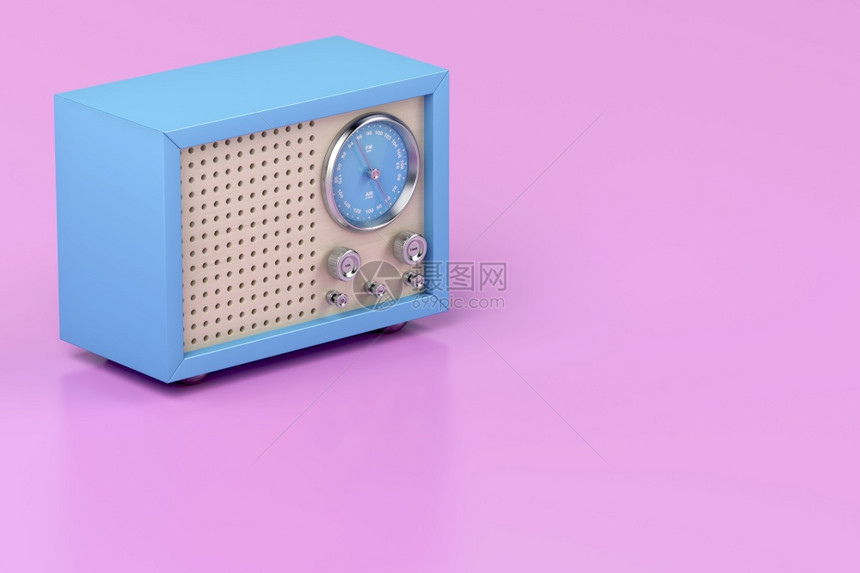 闪亮粉红背景的蓝复光收音机图片